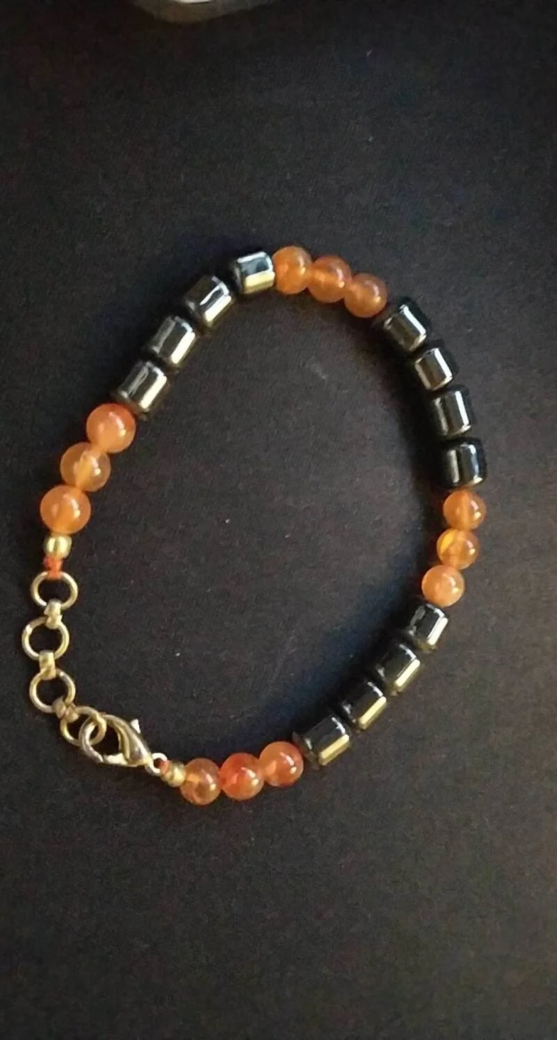 Armband hematiet met amber met slotje